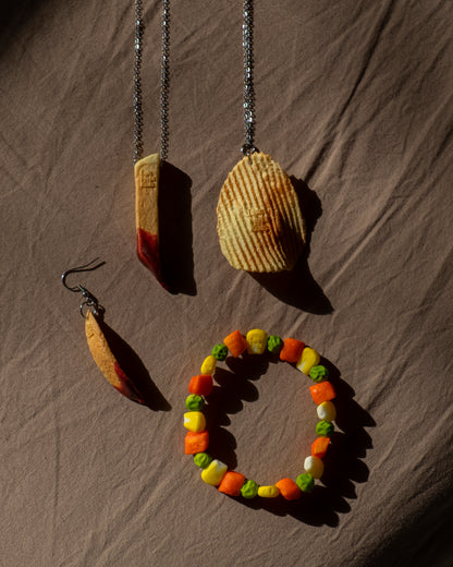 French fry dipped in ketchup earring